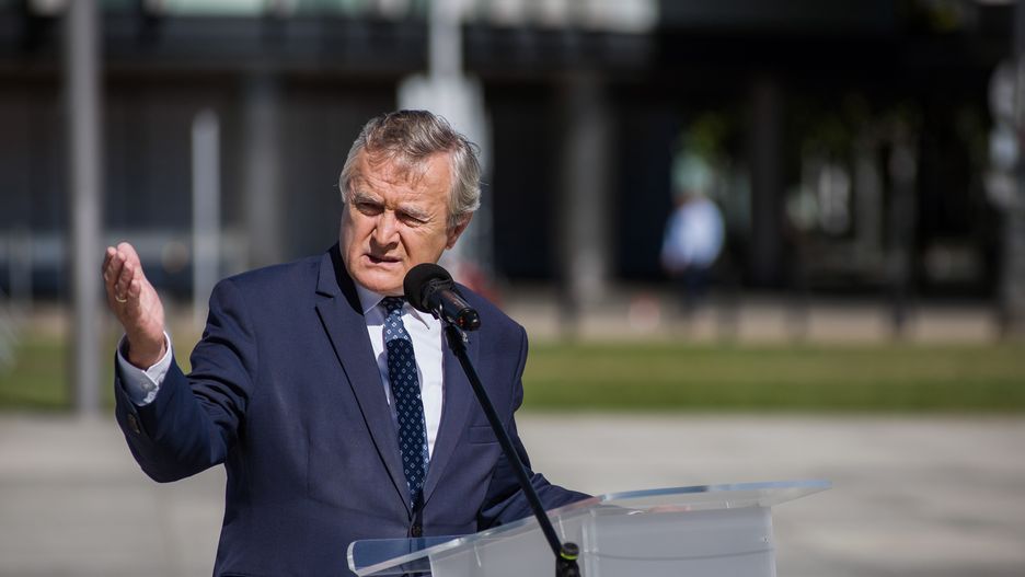 WARSAW, POLAND - 2022/09/02: Minister of Culture and National Heritage, Piotr Glinski speaks during the opening of the #unREDEEMed exhibition in Warsaw. In Warsaw, the Minister of Culture and National Heritage, Piotr Glinski has opened the open-air exhibition #bezprzedawNIEnia (#unREDEEMed), presenting the scale of the destruction and German crimes committed in Poland during World War II. The #unREDEEMed campaign is complementary to the report on war losses, which was presented by the government on September 1st - that is on the 83rd anniversary of the outbreak of World War II. The report included the amount of USD 1,532,170,000,000, which is the estimated amount of war reparations that should be paid to Poland by Germany. (Photo by Attila Husejnow/SOPA Images/LightRocket via Getty Images)
