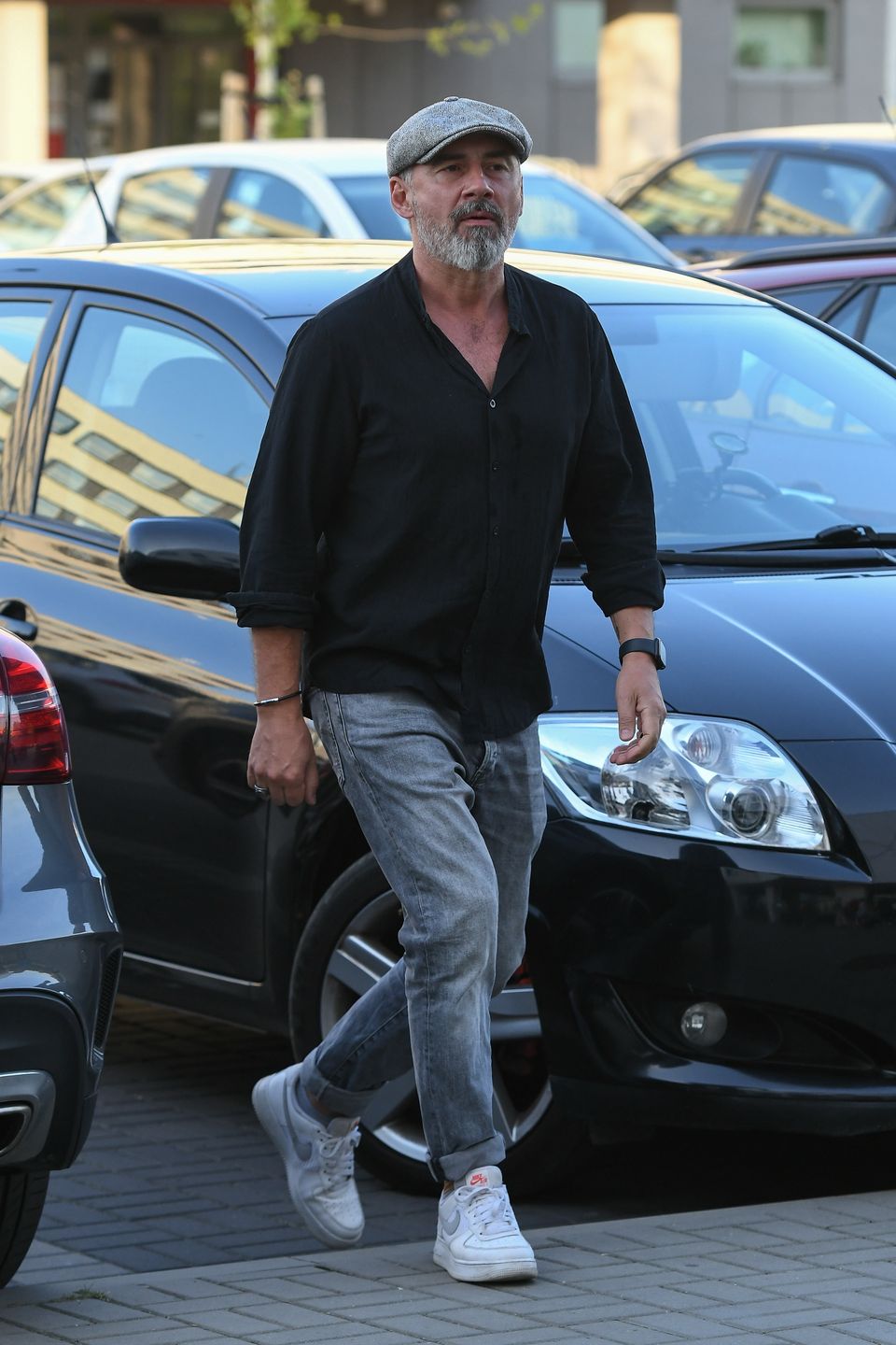 Jacek Kopczyński przybył na premierę z nową partnerką