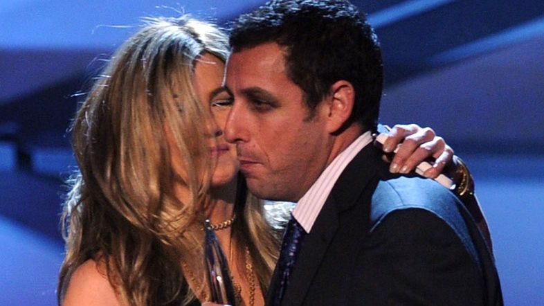 2011 People's Choice Awards - ShowLOS ANGELES, CA - JANUARY 05:  Actress Jennifer Aniston (L) presents the favorite comedic star award to Adam Sandler onstage during the 2011 People's Choice Awards at Nokia Theatre L.A. Live on January 5, 2011 in Los Angeles, California.  (Photo by Kevin Winter/Getty Images)Kevin Winterbestof, topics, topix, toppics, toppix