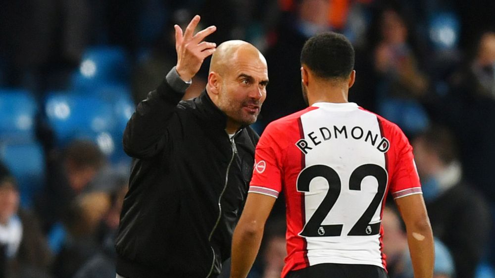 Getty Images / Dan Mullan / Na zdjęciu: Pep Guardiola (L) i Nathan Redmond (P)