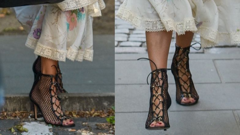 Agnieszka Woźniak-Starak w falbanach przeskakuje ogrodzenie w drodze do swego turkusowego Jeepa (ZDJĘCIA)