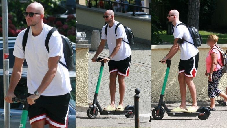 Bartosz Kurek w towarzystwie żony mknie hulajnogą po Sopocie i raczy się zimnym trunkiem