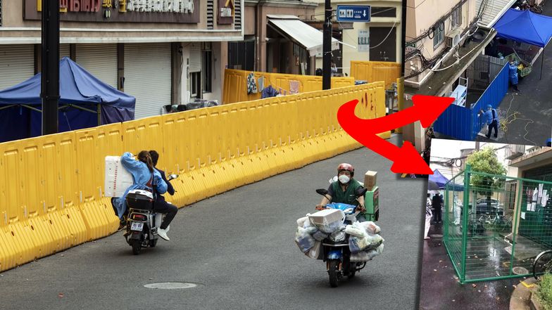 Blokady stawiane przed wejściami do budynków w Szanghaju to element walki z kolejną falą koronawirusa (COVID-19)