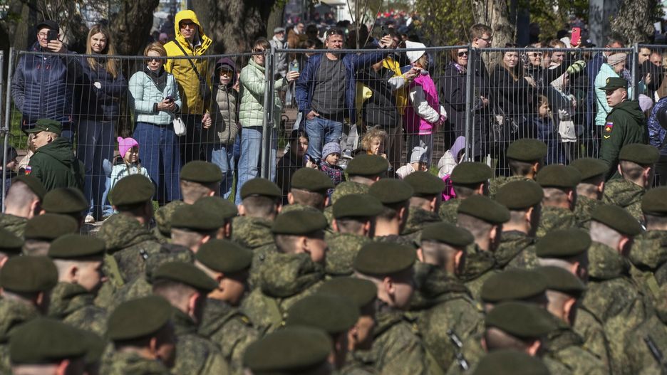 Temporary
People look through a fence at Russian army soldiers marching to attend a rehearsal for the Victory Day military parade at the Dvortsovaya (Palace) Square in St. Petersburg, Russia, Saturday, May 3, 2025. (AP Photo/Dmitri Lovetsky)
Dmitri Lovetsky