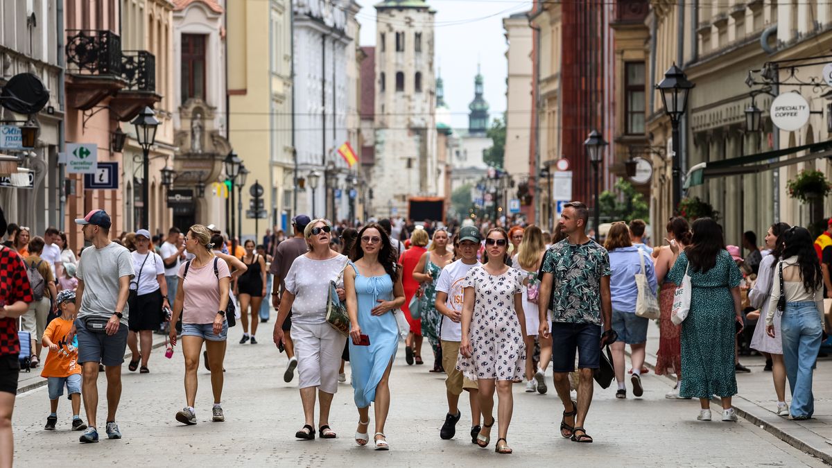 KRAKOW, MALOPOLSKIE, POLAND - 2024/07/11: People walk on Grodzka street in summer clothes in an Old Town as a heat wave hits Krakow. The Polish Institute of Meteorology and Water Management has issued an Excessive Heat Warning, as temperatures over 30 Celsius degrees continue for a few days. (Photo by Dominika Zarzycka/SOPA Images/LightRocket via Getty Images)