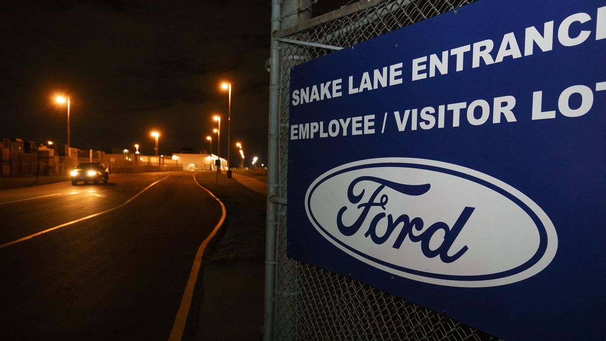 WINDSOR, CANADA - SEPTEMBER 19: A vehicle exits out of the Ford Windsor Engine Plant as negotiations continue past the 11:59pm strike deadline on September 19, 2023 in Windsor, Canada. The current contract that Ford, General Motors, and Stellantis had with UNIFOR, the union representing autoworkers in Canada, expired at 11:59pm on September 18. (Photo by Bill Pugliano/Getty Images)