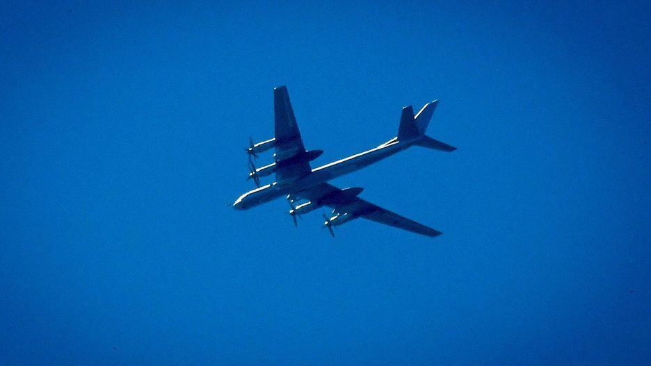 TemporaryA Russian Tupolev Tu-95 turboprop-powered strategic bomber flies over the Moscow region after taking part in a WWII military parade rehearsal in Alabino military training ground outside Moscow on June 15, 2020. (Photo by Yuri KADOBNOV / AFP)YURI KADOBNOV