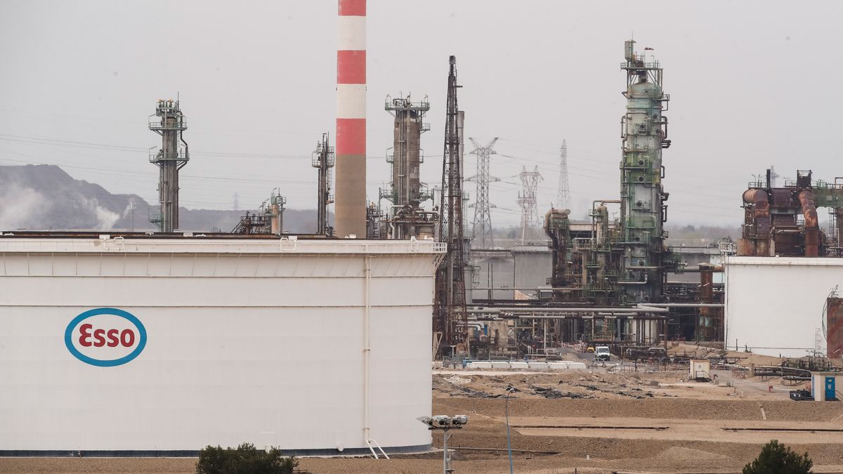 Storage tanks and refining structures at the Esso refinery, operated by Exxon Mobil Corp., in the industrial port area in Fos-sur-Mer, France, on Wednesday, March 29, 2023. A fleet of tankers carrying millions of barrels of oil is backed up off the coast of France as strikes over pension reform rumble on. Photographer: Jeremy Suyker/Bloomberg via Getty Images
