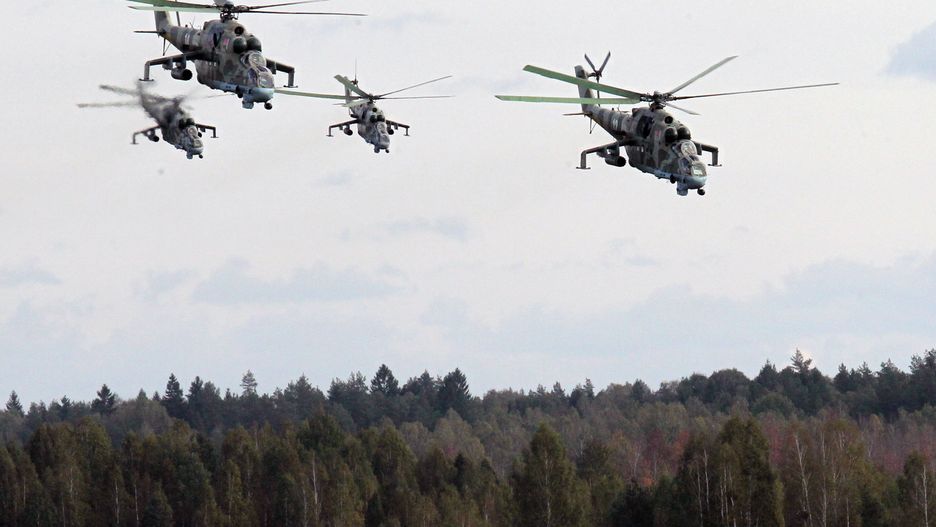 Russian President Vladimir Putin Attends Joint Russian-Belarussian Military Exercise
GRODNO, BELARUS - SEPTEMBER 26:  Helicopters are seen during a joint Russian-Belarussian military exercise at the polygon on September 26, 2013 in Grodno, Belarus. (Photo by Sasha Mordovets/Getty Images)
Sasha Mordovets