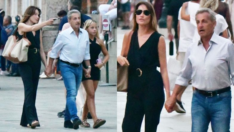 Nicolas Sarkozy spacerował, trzymając za ręce żonę i córkę