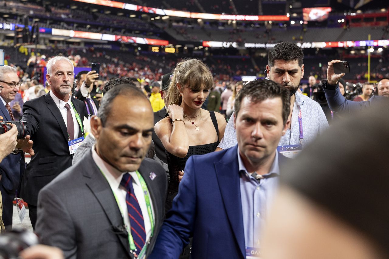 LAS VEGAS, NEVADA - FEBRUARY 11: Taylor Swift reacts as she walks off the field following the NFL Super Bowl 58 football game between the San Francisco 49ers and the Kansas City Chiefs at Allegiant Stadium on February 11, 2024 in Las Vegas, Nevada. (Photo by Michael Owens/Getty Images)