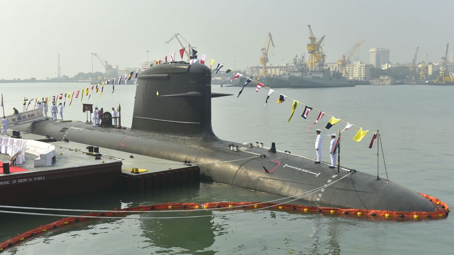 MUMBAI, INDIA - NOVEMBER 25: Indian Naval officers standing on the deck of INS Vela Submarine during its commissioning ceremony at Naval Dockyard, on November 25, 2021 in Mumbai, India. The Indian Navy has commissioned its fourth, stealth Scorpene-class submarine under Project 75, INS Vela on Thursday. Known as the 'Silent Killer', this induction will boost the Navy's combat capability. (Photo by Anshuman Poyrekar/Hindustan Times via Getty Images)