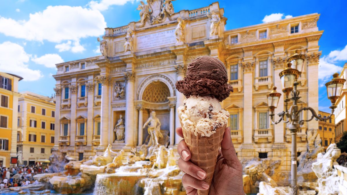 Tourist,Eats,An,Ice,Cream,In,Front,Of,The,Trevi
fountain,ice cream cone,trevi,roman,facade,ice,gelato,cone,building,ice cream,landmark,vanilla,rome,sightseeing,roma,baroque,old,european,frozen,cream,water,marble,neptune,chocolate,city,trevi fountain,tourism,cold,monument,fontana,summer,tourist,travel photographer,europe,italy,antiquities,architecture,editorial,art,famous,historic,column,italian,sculpture,dessert,culture,tourists,sweet,travel,landscape