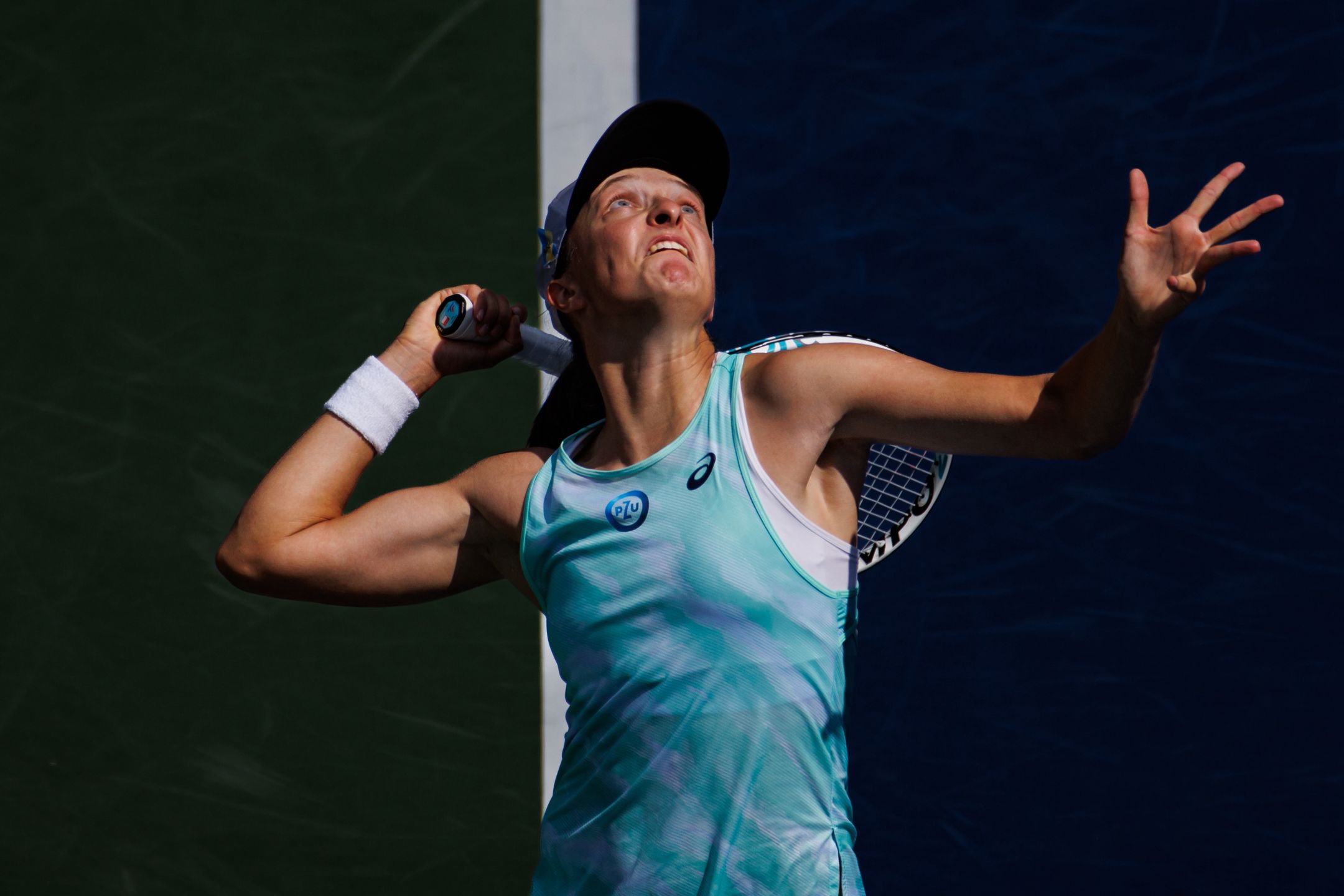 MASON, OHIO - AUGUST 18: Iga Swiatek of Poland serves against Madison Keys of the United States in the third round of the women's singles at the Lindner Family Tennis Center on August 18, 2022 in Mason, Ohio. (Photo by Frey/TPN/Getty Images)