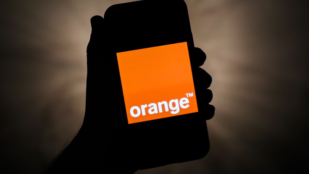 Orange logo is seen displayed on a phone screen in this illustration photo taken in Poland on November 19, 2020. (Photo by Jakub Porzycki/NurPhoto via Getty Images)
