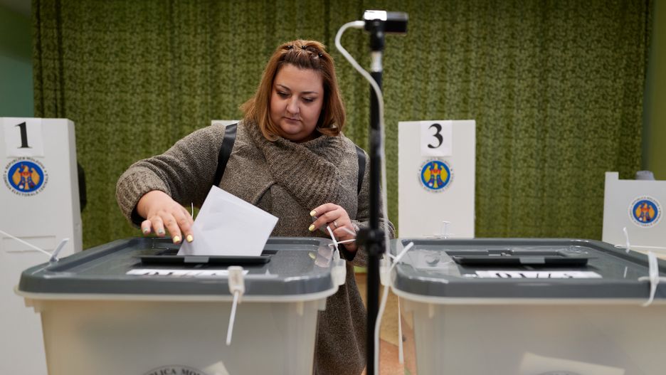 VARNITA, MOLDOVA - OCTOBER 20: Residents of Russian-occupied Transnistria cast their ballots at a polling station designated for voters from Transnistria on October 20, 2024 in Varnita, Moldova. Moldova holds its presidential election on Sunday, with incumbent pro-EU President Maia Sandu facing former prosecutor Alexandr Stoianoglo, backed by the pro-Russian Socialist Party, and nine other candidates. Voters will also decide in a referendum whether to amend the constitution to make EU membership an official national goal. (Photo by Pierre Crom/Getty Images)