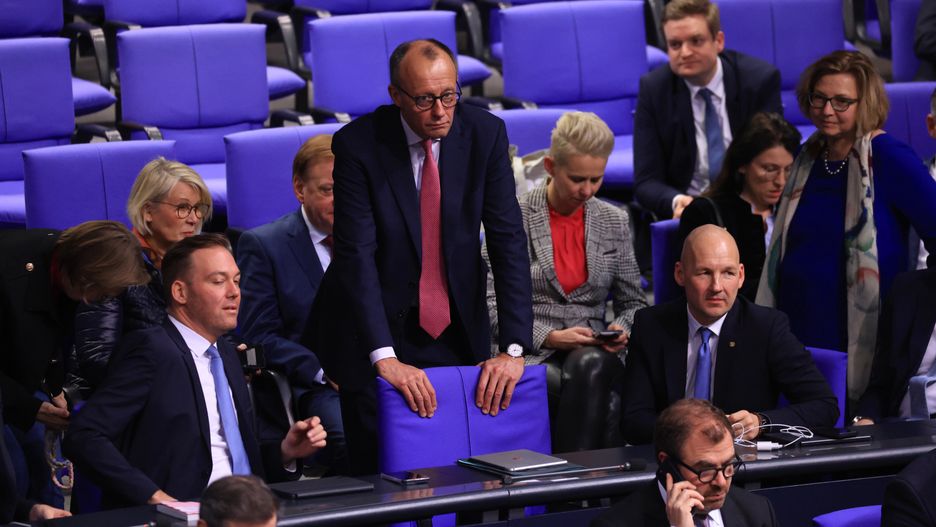 Friedrich Merz, leader of the Christian Democratic Union (CDU), center, in the Bundestag chamber during the immigration bill vote in Berlin, Germany, on Friday, Jan. 31, 2025. The bill aims to reduce irregular immigration and give federal police more powers to carry out deportations, but has been denounced by the ruling Social Democrats and Greens as unconstitutional. Photographer: Krisztian Bocsi/Bloomberg via Getty Images