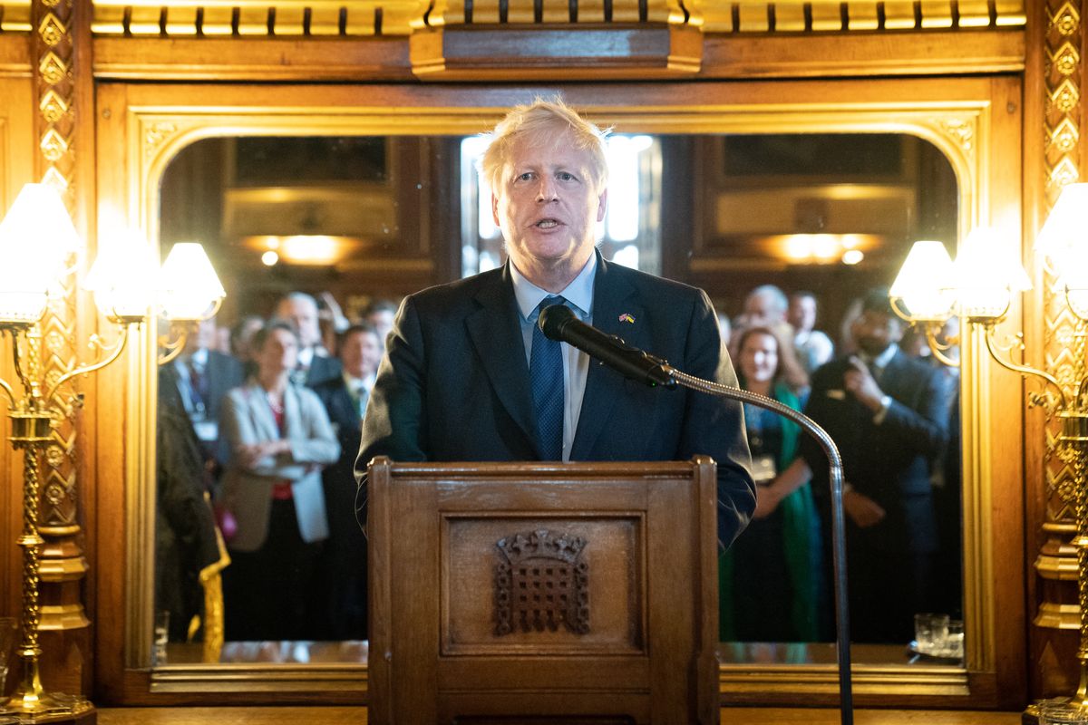 Prime Minister Boris Johnson speaks at a reception of Falklands veterans after they attended a special Beating Retreat ceremony by the Band of Her Majesty's Royal Marines in Speaker's Court at the Palace of Westminster, to commemorate the 40th anniversary of the Falkland Islands conflict. Picture date: Tuesday June 7, 2022. (Photo by Stefan Rousseau/PA Images via Getty Images)