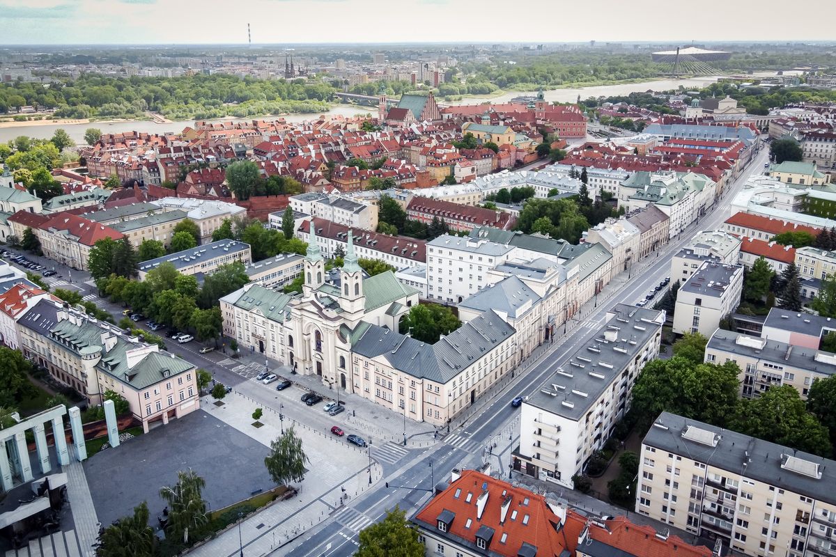 A drone view of Miodowa Street and Dluga Street, the Old Town in the background, in Warsaw, Poland on May 24, 2020 (Photo by Mateusz Wlodarczyk/NurPhoto via Getty Images)