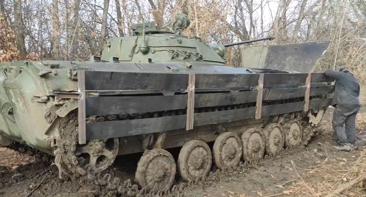 Russian BMP-2 reinforced with planks.