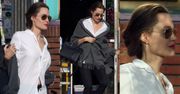 Wyniosła Angelina Jolie eksponuje dekolt w białej koszuli