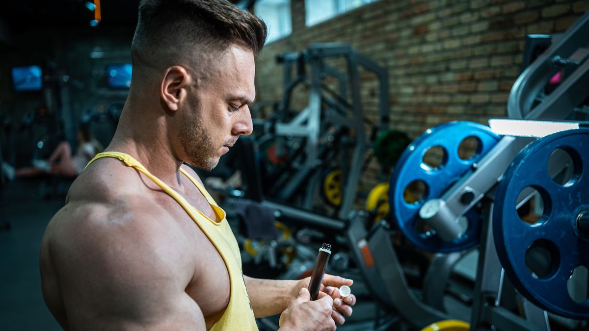 muscular athlete drink liquid vitamin b 12 or supplement in small disposable black bottle, bodybuilder man using sport nutrition in ampule drops
muscular athlete drink liquid vitamin b 12 or supplement in small disposable black bottle, bodybuilder man using sport nutrition in ampule drops. High quality photo
Goami