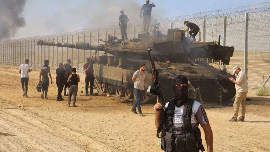 GAZA CITY, GAZA - OCTOBER 07: Hamas' armed wing, the Izz ad-Din al-Qassam Brigades destroy a tank of Israeli forces in Gaza City, Gaza on October 07, 2023. (Photo by Hani Alshaer/Anadolu Agency via Getty Images)