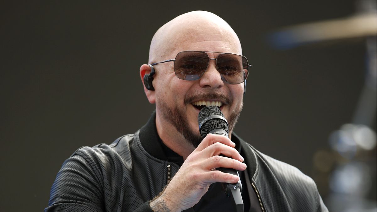 DAYTONA BEACH, FLORIDA - FEBRUARY 16: Pitbull performs onstage during pre-race ceremonies prior to the NASCAR Cup Series Daytona 500 at Daytona International Speedway on February 16, 2025 in Daytona Beach, Florida. (Photo by Mike Ehrmann/Getty Images)