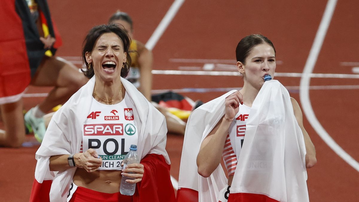 MUNICH, GERMANY - AUGUST 21: Pia Skrzyszowska (R) and Anna Kielbasinska of Germany celebrate after winning silver medal for their team after competing in Women's 4x100m Relay Final in the 2022 Multi-Branch European Championship at Olympic Stadium in Munich, Germany on August 21, 2022. (Photo by Abdulhamid Hosbas/Anadolu Agency via Getty Images)