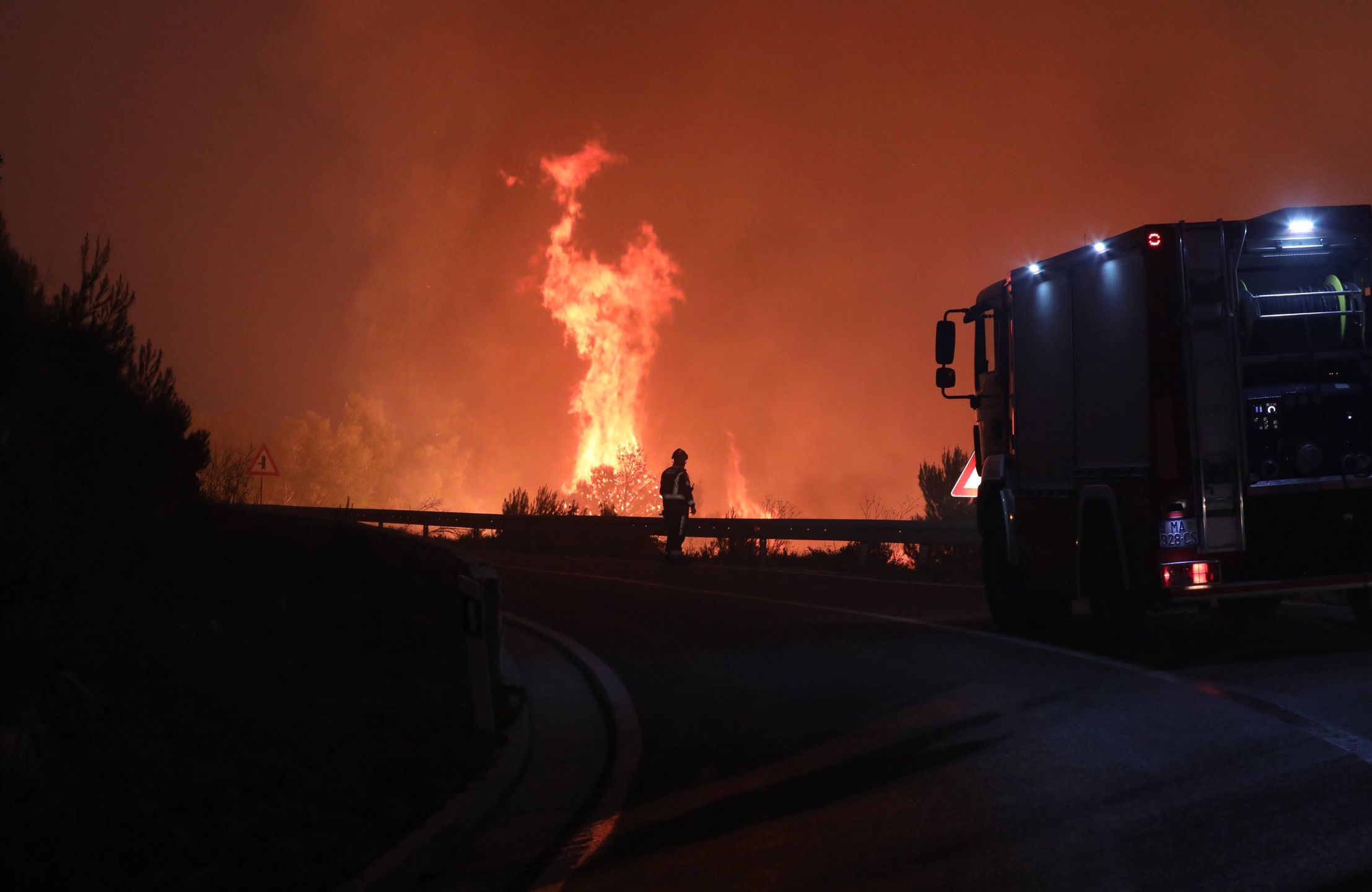 The fire penetrated the Biokovo Nature Park, engulfing the ranch, houses and vehicles in Tucepi
A big fire broke out in Tucepi, near Makarska, Croatia on July 30, 2024. A road in the town is closed due to firefighting and traffic is diverted to detours. The fire that broke out in Tucepi is now spreading towards Podgora. Fire brigades from Split, Omis and Makarska are at the fire place and 30 more firefighters left from Zagreb to hel their colleauges. The fire broke out yesterday around 8.15 PM and according to the Fire station of Split-Dalmatia County grass and maquis are burning and teh fire is spreading quickly due to the wind. The fire throughout the night, July 31, penetrated the Nature Park Biokovo, but also the ranch, houses and vehicles. The population is urged to be careful and follow the further instructions of the services. Photo: Ivo Cagalj/PIXSELL 
Dostawca: PAP/PIXSELL
Ivo Cagalj/PIXSELL
firefighters, fire, Tucepi, Makarska, Croatia