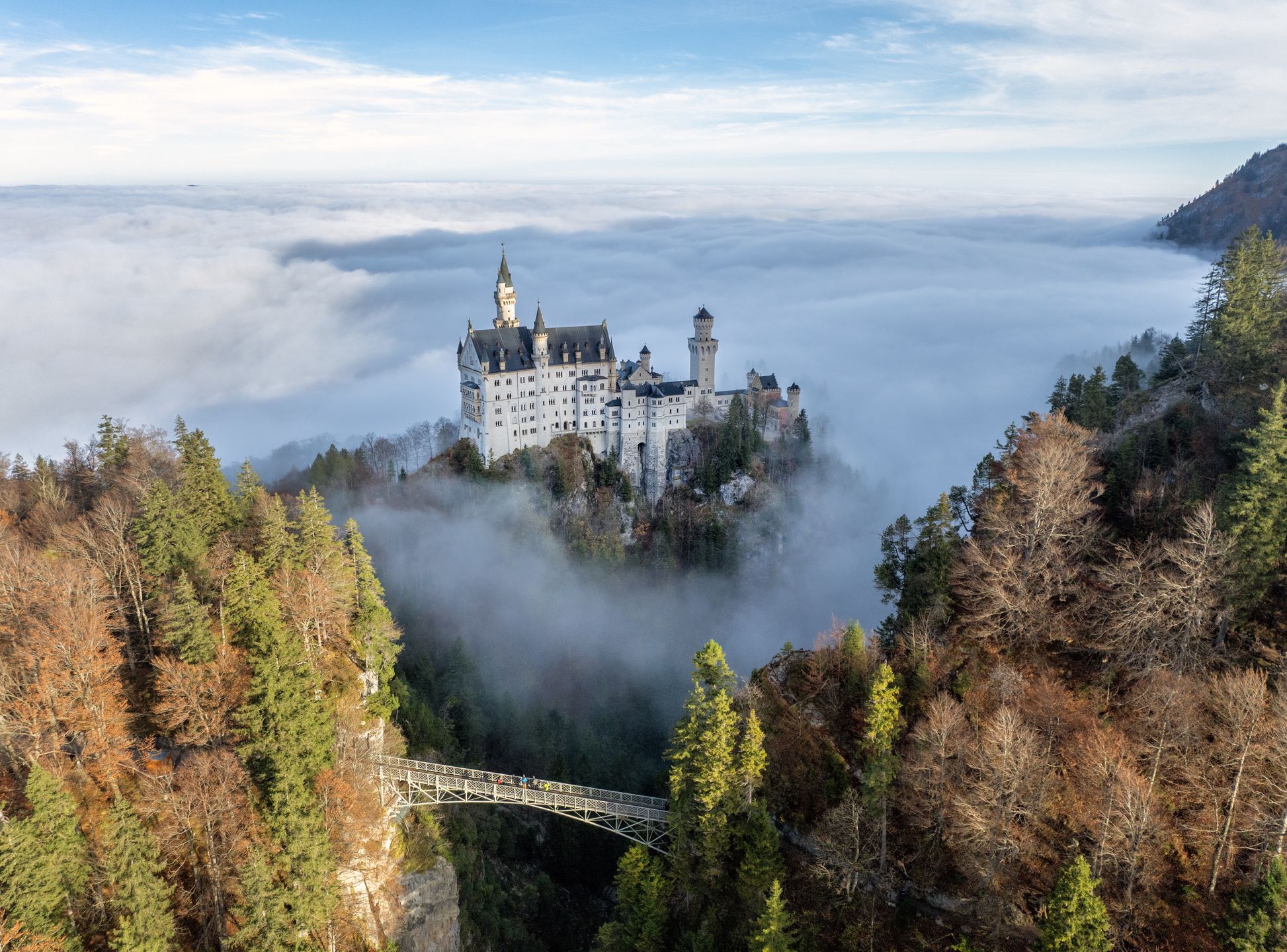 HOHENSCHWANGAU, BAVARIA , GERMANY - OCTOBER 31:  Mist surrounds the Neuschwanstein Castle on October 31.2024 in Hohenschwangau, Germany. (Photo by Chris Gorman/Getty Images)