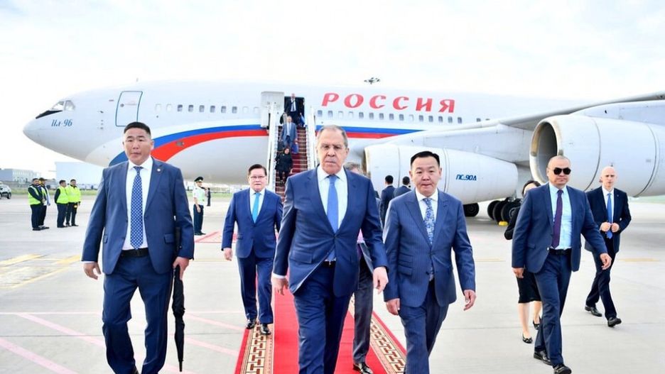 ULAANBAATAR, MONGOLIA - JULY 05: (----EDITORIAL USE ONLY - MANDATORY CREDIT - "MONGOLIAN FOREIGN MINISTRY / HANDOUT" - NO MARKETING NO ADVERTISING CAMPAIGNS - DISTRIBUTED AS A SERVICE TO CLIENTS----) Russian Foreign Minister Sergei Lavrov (C) arrives at the airport as part of the visit Mongolia in Ulaanbaatar, Mongolia on July 05, 2022. (Photo by Mongolian Foreign Ministry / Handout/Anadolu Agency via Getty Images)