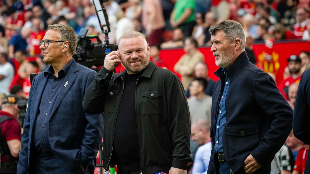 MANCHESTER, ENGLAND - MAY 12: Sky Sports pundit Paul Merson and Former Manchester United players and Sky Sports pundits Wayne Rooney and Roy Keane stand pitchside ahead of the Premier League match between Manchester United and Arsenal FC at Old Trafford on May 12, 2024 in Manchester, England. (Photo by Ash Donelon/Manchester United via Getty Images)