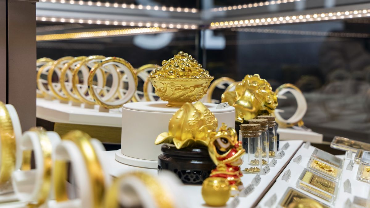 Gold products inside a Luk Fook Holdings International Ltd. jewelry store in Shanghai, China, on Wednesday, March 13, 2024. Weighing as little as one gram, the beans  and other forms of gold jewelry  are increasingly viewed as the safest investment bet for young Chinese in an era of economic uncertainty. Photographer: Qilai Shen/Bloomberg via Getty Images