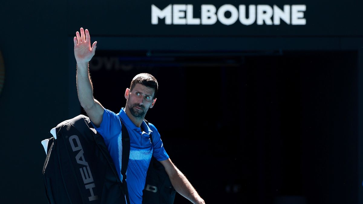 MELBOURNE, AUSTRALIA - JANUARY 24: Novak Djokovic of Serbia acknowledges the crowd as he leaves the court after retiring from the Men's Singles Semifinal against Alexander Zverev of Germany during day 13 of the 2025 Australian Open at Melbourne Park on January 24, 2025 in Melbourne, Australia. (Photo by Darrian Traynor/Getty Images)