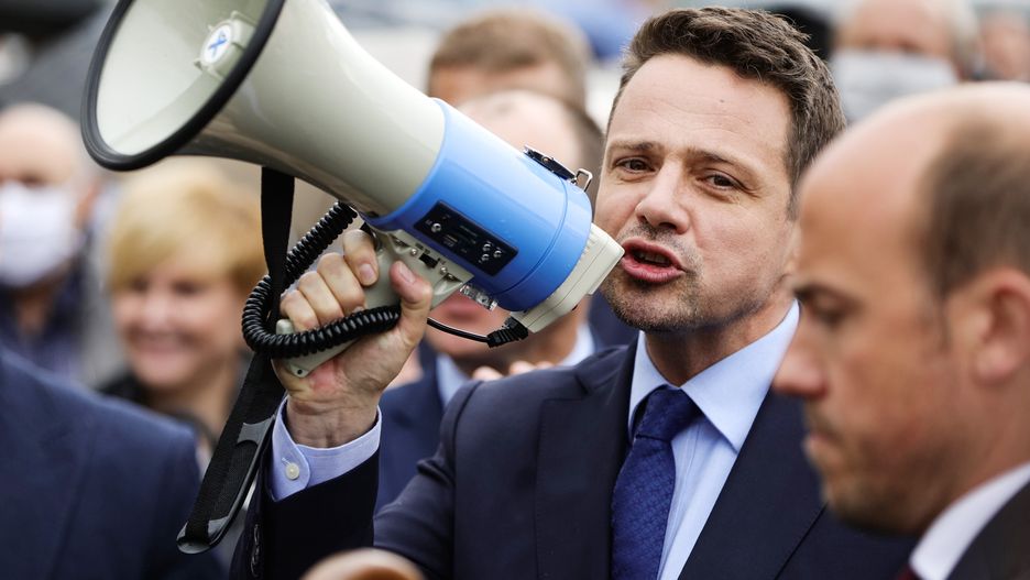 OSWIECIM, LESSER POLAND, POLAND - 2020/06/05: Rafal Trzaskowski speaking on a megaphone during a campaign.Rafal Trzaskowski, President of the Polish capital, the city of Warsaw, and recently a candidate of the centre-right Civic Coalition for the Presidency of the country. Relatively young and excellently educated, he is the main competitor of the incumbent President Andrzej Duda. Trzaskowski visits smaller towns in Lesser Poland, in this case Oswiecim, encouraging voters to sign the list of support for his candidacy and cast their vote for him. (Photo by Filip Radwanski/SOPA Images/LightRocket via Getty Images)