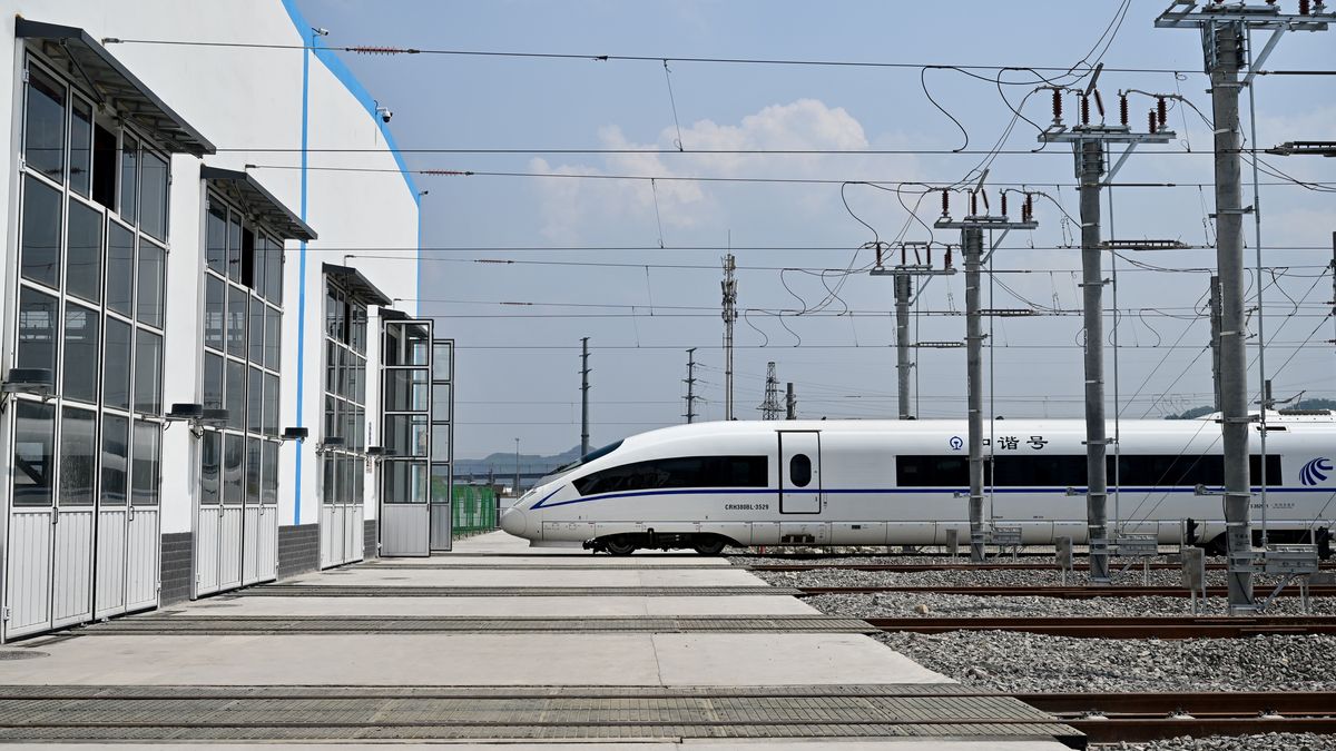NINGBO, CHINA - APRIL 09: A high-speed train arrives at the Yongjin high-speed train base on April 9, 2025 in Ningbo, Zhejiang Province of China. Yongjin high-speed train base started operation in Nongbo, marking the inaugural of the first high-speed train depot across a 100-meter river in the Yangtze River Delta. The base plans to construct 40 tracks with 24 tracks and 6 inspection tracks already completed, which can provide maintenance, sewage and cleaning services for 12 high-speed rail EMUs at the same time. (Photo by Dong Xuming/Zhejiang Daily Press Group/VCG via Getty Images)