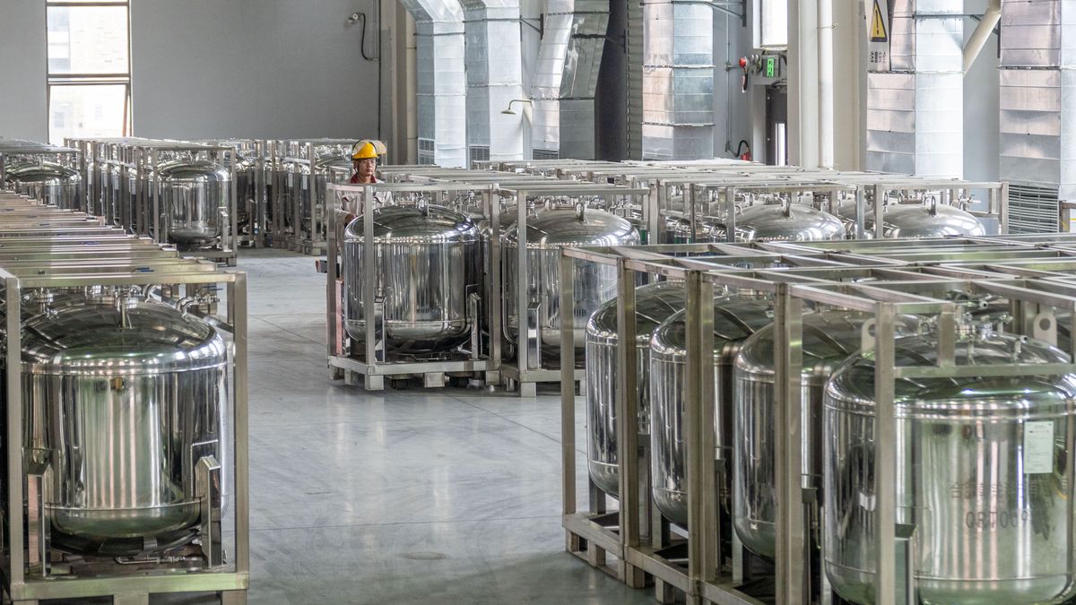 HEFEI, CHINA - OCTOBER 17, 2024 - Workers work at an electric vehicle power battery electrolyte production workshop of Hefei Ganrui Technology Co LTD in Hefei, East China's Anhui province, Oct 17, 2024. (Photo credit should read CFOTO/Future Publishing via Getty Images)