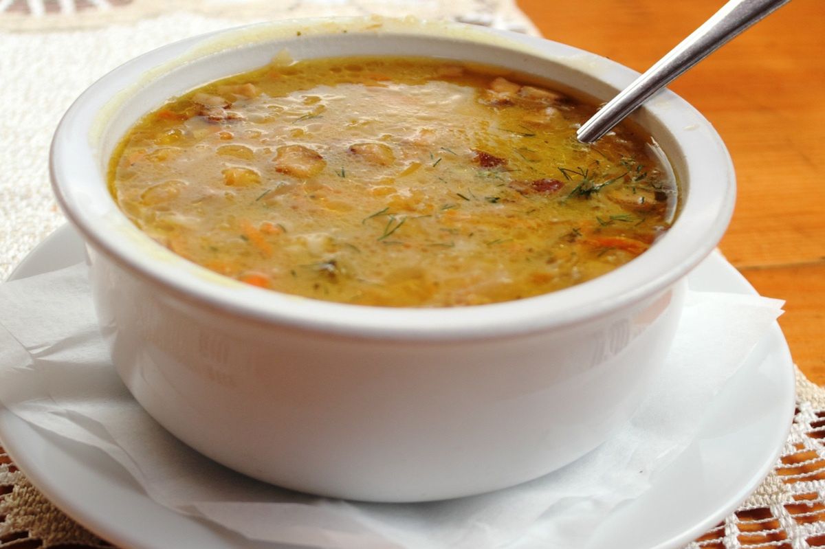 Pickle soup in a white bowl