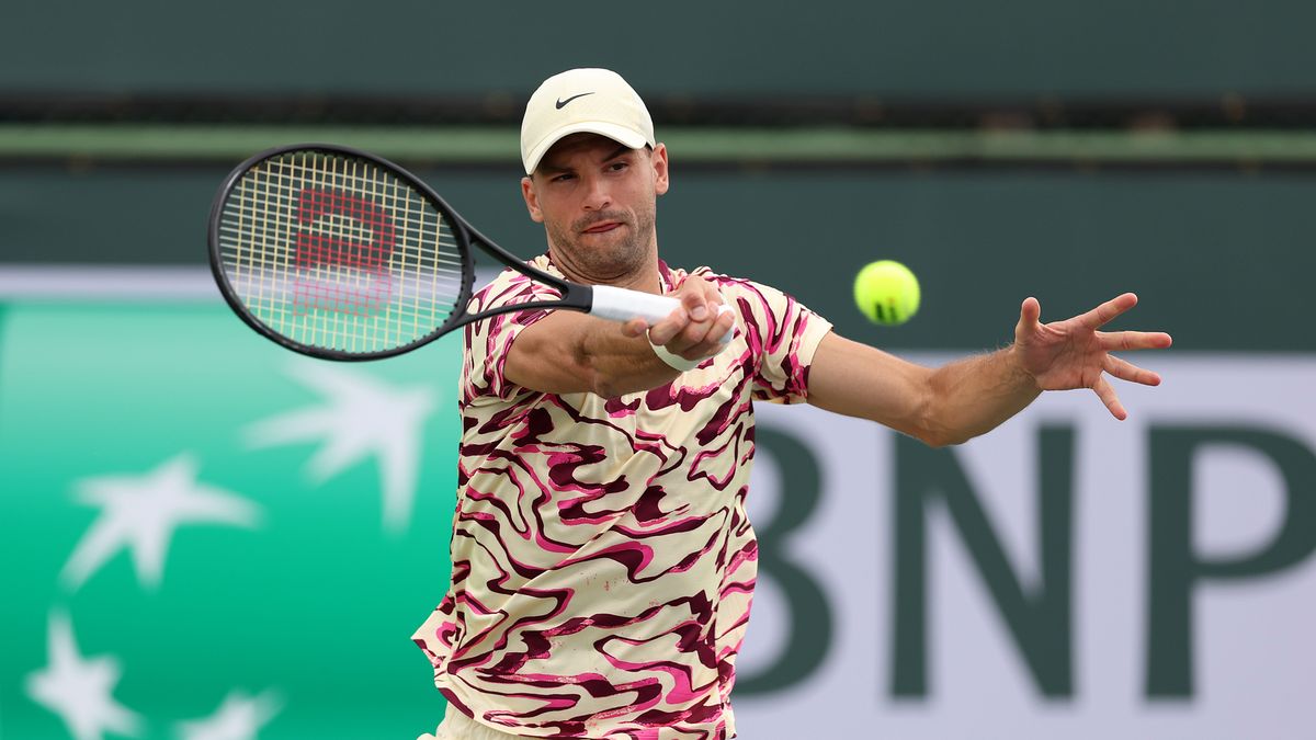 INDIAN WELLS, CALIFORNIA - MARCH 10: Grigor Dimitrov of Bulgaria in action against Jason Kubler of Australia during the BNP Paribas Open on March 10, 2023 in Indian Wells, California. (Photo by Julian Finney/Getty Images)