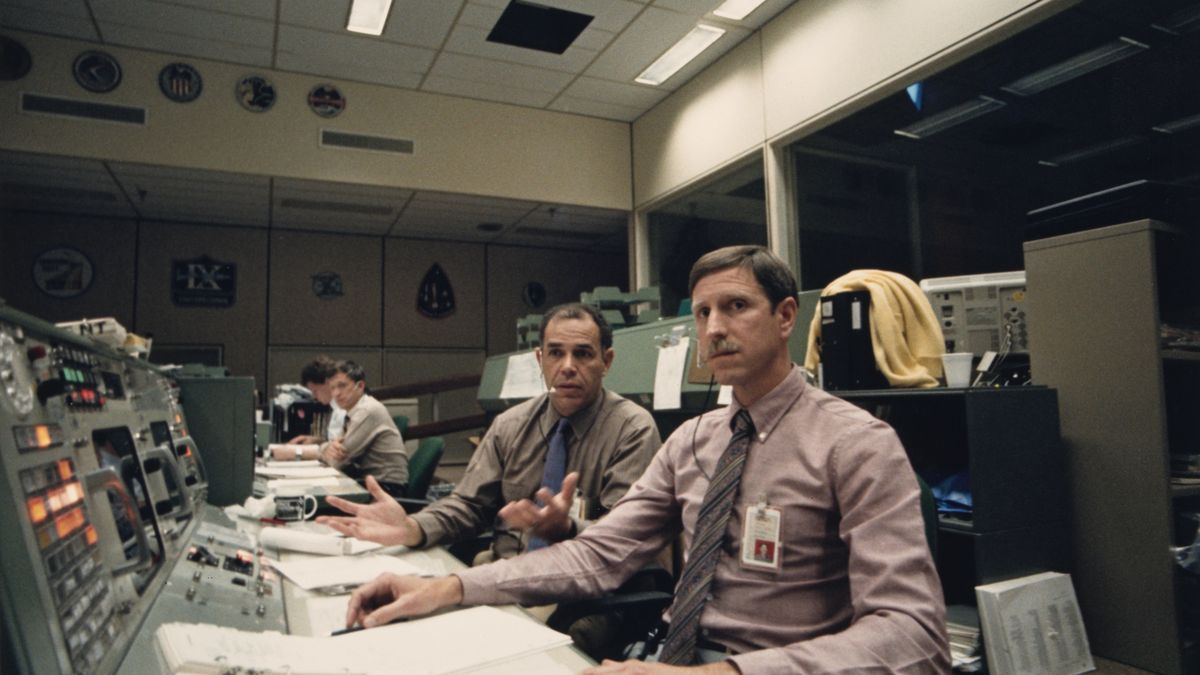 American astronauts Frederick D Gregory and Richard O Covey, spacecraft communicators for the STS 51-L launch team, soon after became apparent that Challenger's launch was 'not nominal', at Lyndon B Johnson Space Center (JSC) in Houston, Texas, 28th January 1986. Mission STS-51-L saw the Space Shuttle Challenger break apart shortly after launch, killing all seven crew members. (Photo by Space Frontiers/Archive Photos/Getty Images)