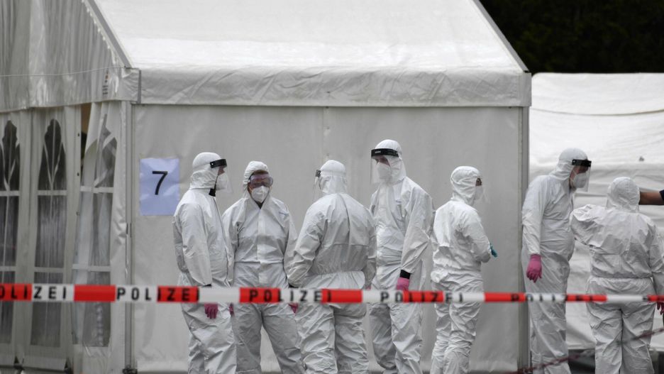 arch39Members of a coronavirus testing station stand on the factory premises of the Westfleisch meat processing company in Hamm, western Germany, on May 10, 2020, as all workers of the company have to be tested on the novel coronavirus after a spike in cases at their slaughterhouse. - Local authorities in the western federal state of North Rhine-Westphalia announced on May 8, 2020 that reopening plans were postponed and an "emergency mechanism" would come into effect due to high infection rates in the region. Many of the Westfleisch company's workers, partially originating from Eastern Europe and housed in shared accomodation, were tested positive on the novel coronavirus that can cause the COVID-19 disease. (Photo by Ina FASSBENDER / AFP)INA FASSBENDER
