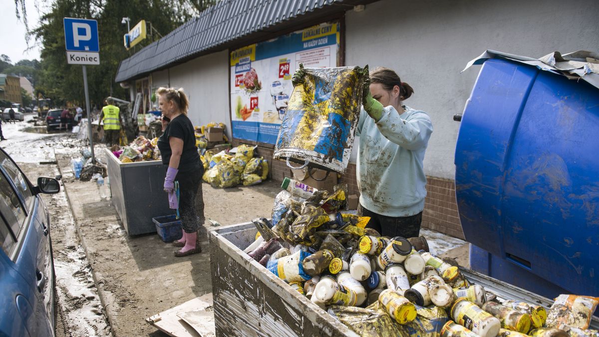 GLUCHOLAZY, OPOLE VOIVODESHIP, POLAND - 2024/09/19: Citizens throw away their belongings destroyed in the aftermath of flooding in Glucholazy in southern Poland. In southwestern Poland, heavy rains and cyclones sweeping through central Europe have led to severe flooding. Rivers such as the Odra, Nysa Kodzka, Bystrzyca or Biala Glucholaska in Glucholazy city experienced a sharp rise in water levels, causing numerous floods and the breach of flood embankments. Authorities are working to manage the situation, with ongoing efforts to prevent further damage. (Photo by Attila Husejnow/SOPA Images/LightRocket via Getty Images)