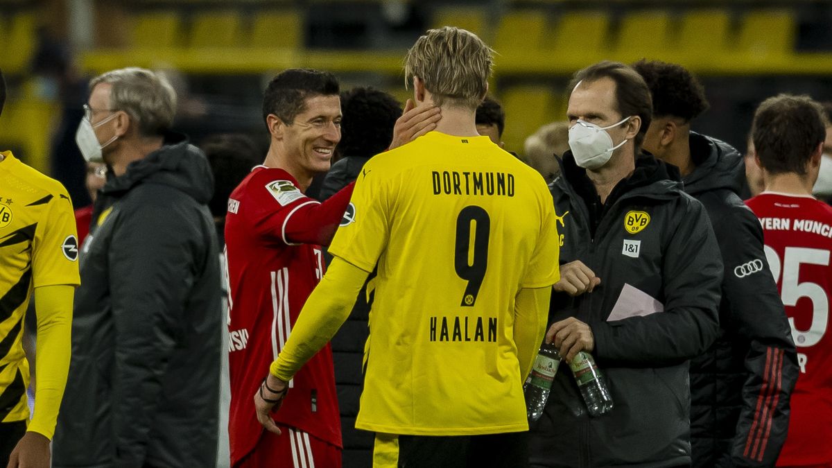 DORTMUND, GERMANY - NOVEMBER 07: Erling Haaland of Borussia Dortmund and Robert Lewandowski of FC Bayern Muenchen after the final whistle during the Bundesliga match between Borussia Dortmund and FC Bayern Muenchen at the Signal Iduna Park on November 07, 2020 in Dortmund, Germany. (Photo by Alexandre Simoes/Borussia Dortmund via Getty Images)