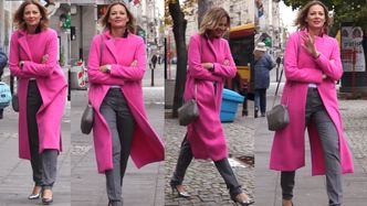 Odeta Moro w długim, różowym płaszczu pod TVN-em