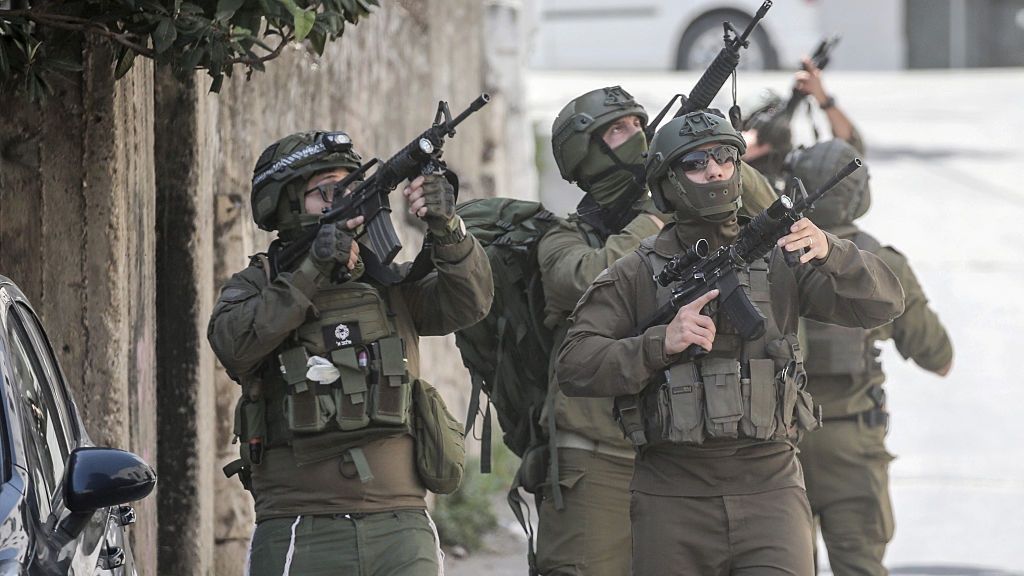 Israeli soldiers take position in the middle of the market
NABLUS, PALESTINE - 2026/04/27: Israeli soldiers take position in the middle of the market in the Old City of Nablus during a security operation. Israeli forces raided the market, targeting shops. Dozens of Palestinians were arrested in West Bank cities under the control of the Palestinian Authority, headed by President Mahmoud Abbas. (Photo by Nasser Ishtayeh/SOPA Images/LightRocket via Getty Images)
SOPA Images
operation, armed, market, israeli-palestine, security operation, soldier, soldiers, raid, west bank, idf, israeli, operations, troops