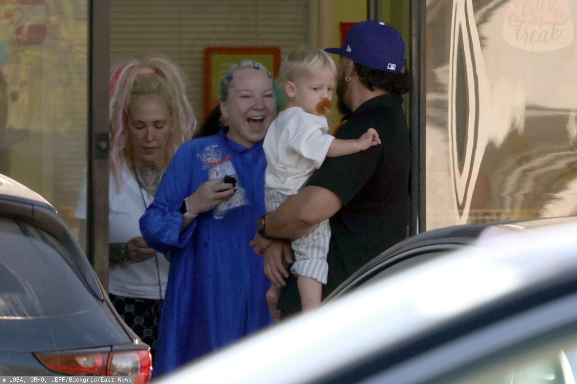 Sia z synem na dziecięcej siłowni