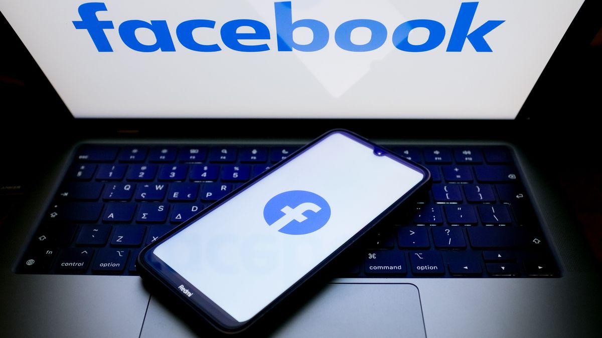 The Facebook logo is being displayed on a smartphone screen and on a computer screen in Athens, Greece, on May 13, 2024. (Photo by Nikolas Kokovlis/NurPhoto via Getty Images)