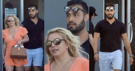 Ciężarna Britney Spears ZAKRYWA BRZUSZEK torebką, drepcząc przez lotnisko z narzeczonym u boku (ZDJĘCIA)