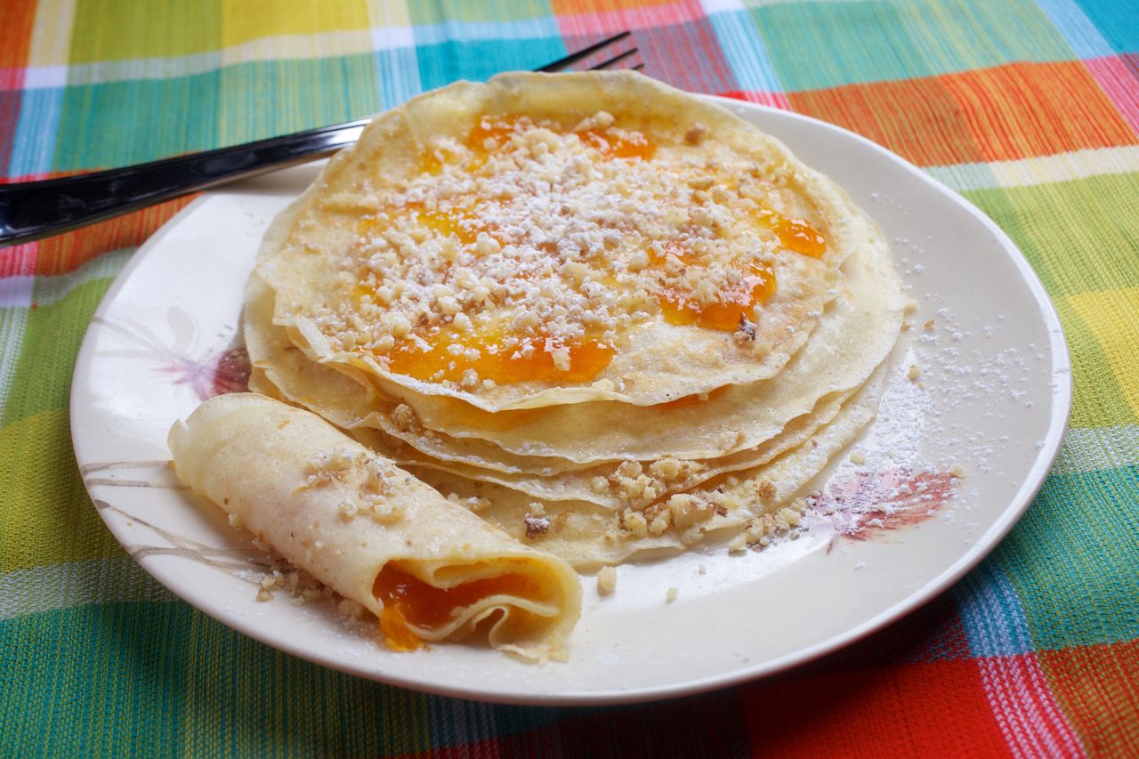 sauteed peaches elevate classic ricotta pancakes